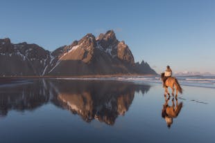 The magnificent Vestrahorn mountain on a bright and still day in the Autumn.