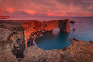 The iconic rock arch of Dyrhólaey, found on Iceland's South Coast.