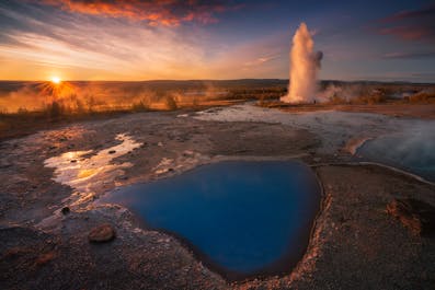Strokkur explodes at Haukadalur geothermal valley.