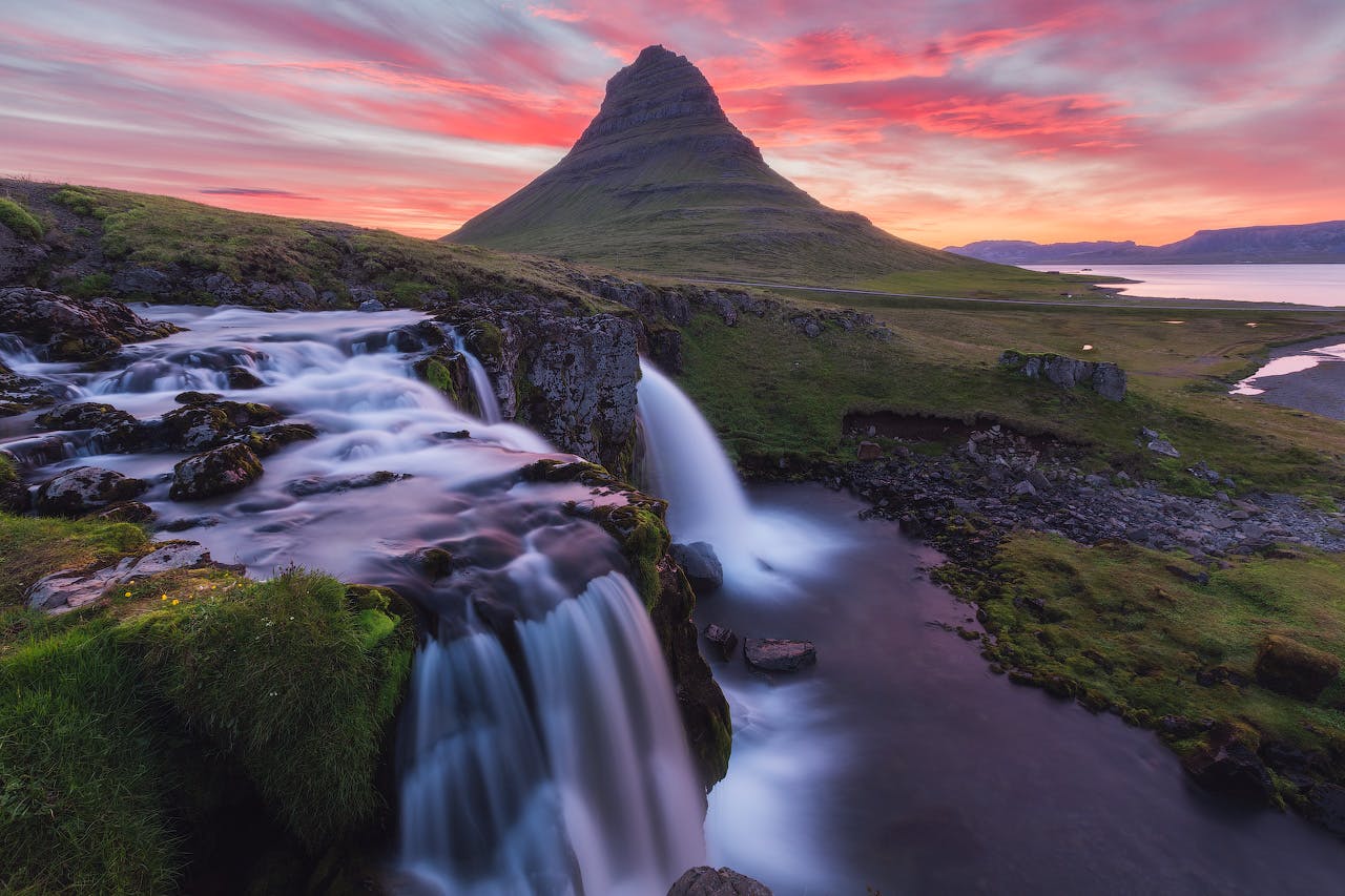 The pretty waterfall Kirkjufellsfoss serves as a perfect foreground subject to capture the majesty of Mount Kirkjufell.
