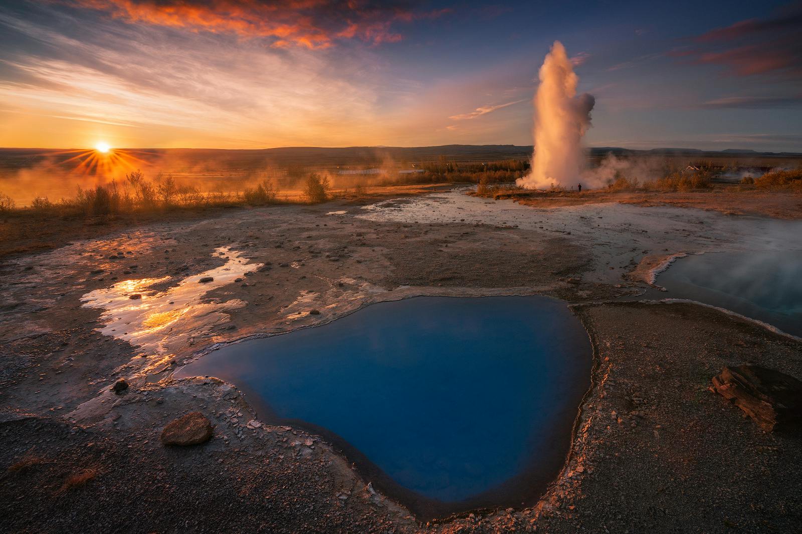 A geyser explodes at Haukadalur Geothermal Valley, on the Golden Circle sightseeing route in Iceland.