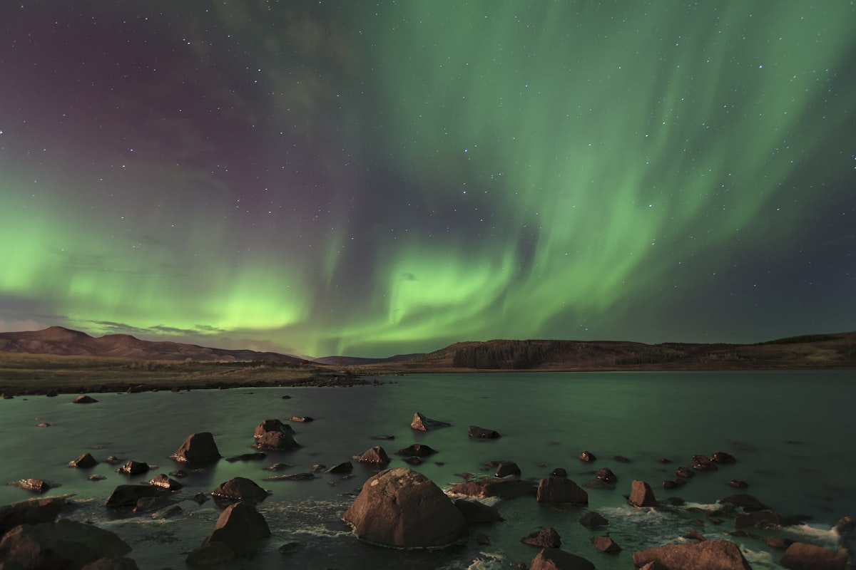 Northern lighting. Полярное сияние Исландия. Исландия Рейкьявик Северное сияние. Iceland Северное сияние. Северное сияние над Исландией.