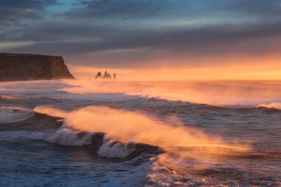 The Reynisdrangar sea stacks punctuate Iceland's stunning South Coast.