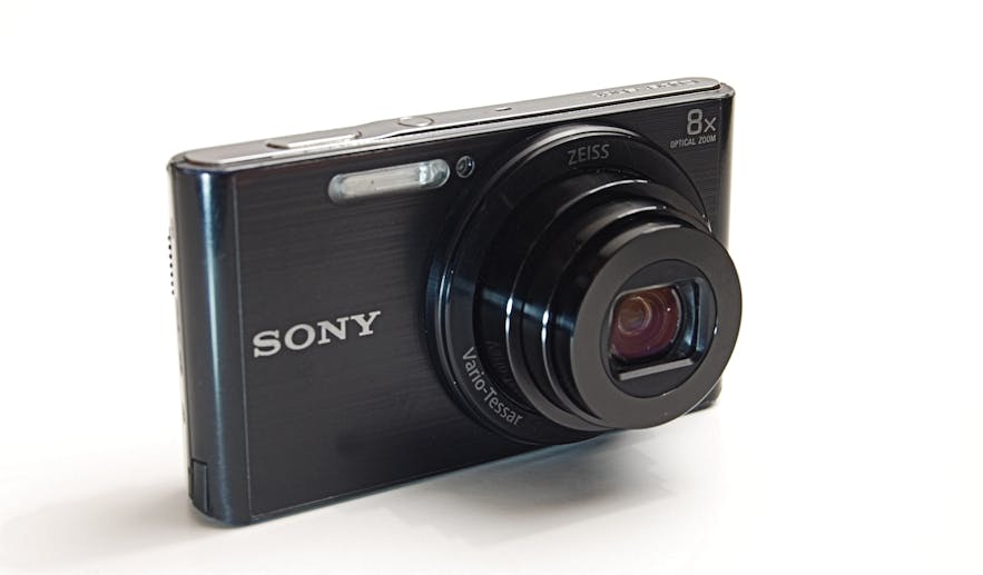 A compact camera in a white area - types of cameras | digital
