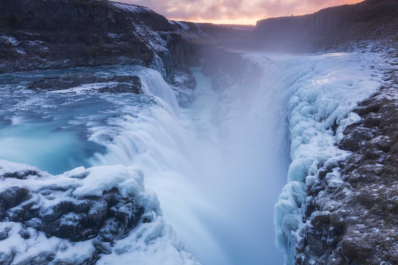 Gullfoss thunders into an ancient canyon, which in winter, becomes cloaked in thick layers of snow and ice.
