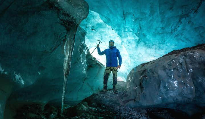Exploring the enchanting Blue Ice Cave, a moment of awe in nature's frozen masterpiece.