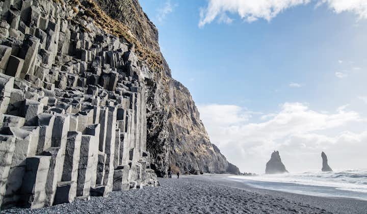 Majestic basalt stacks against the backdrop of Reynisfjara beach.