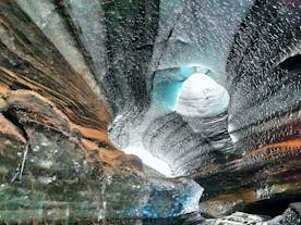 Intricate patterns and textures carved into the walls of the enchanting Katla Ice Cave.