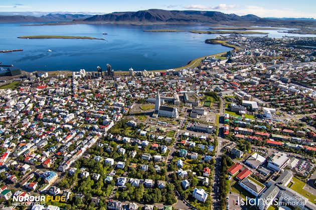 Capture the mesmerizing aerial view of Reykjavik from this exhilarating helicopter tour.