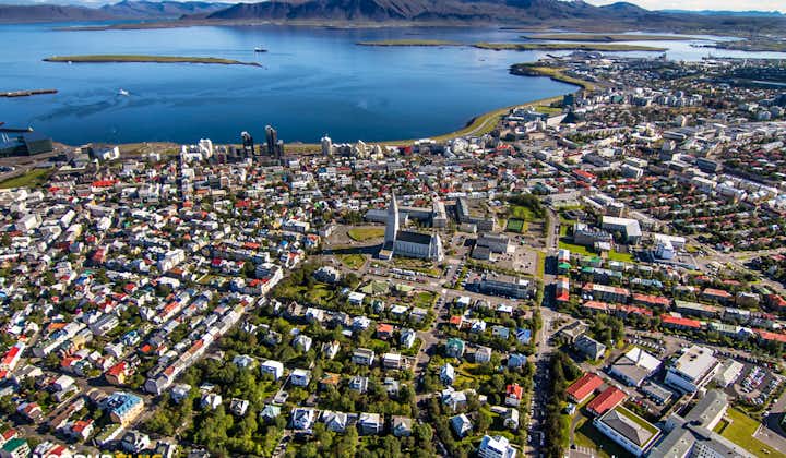 Capture the mesmerizing aerial view of Reykjavik from this exhilarating helicopter tour.