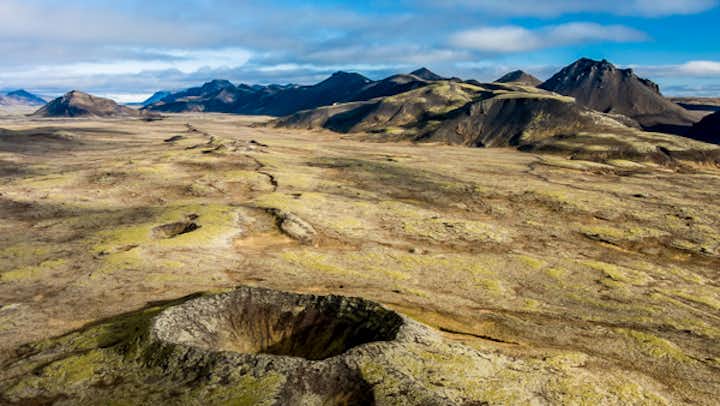 Witness the raw power and beauty of Iceland's volcanic wonders from above.