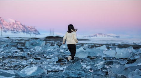 Icebergs from Jokulsarlon glacier lagoon wash up on Diamond Beach, creating a glistening spectacle of natural beauty.