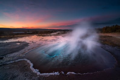 The Geysir geothermal area is one of three spectacular Golden Circle attractions and looks incredible under the setting sun.